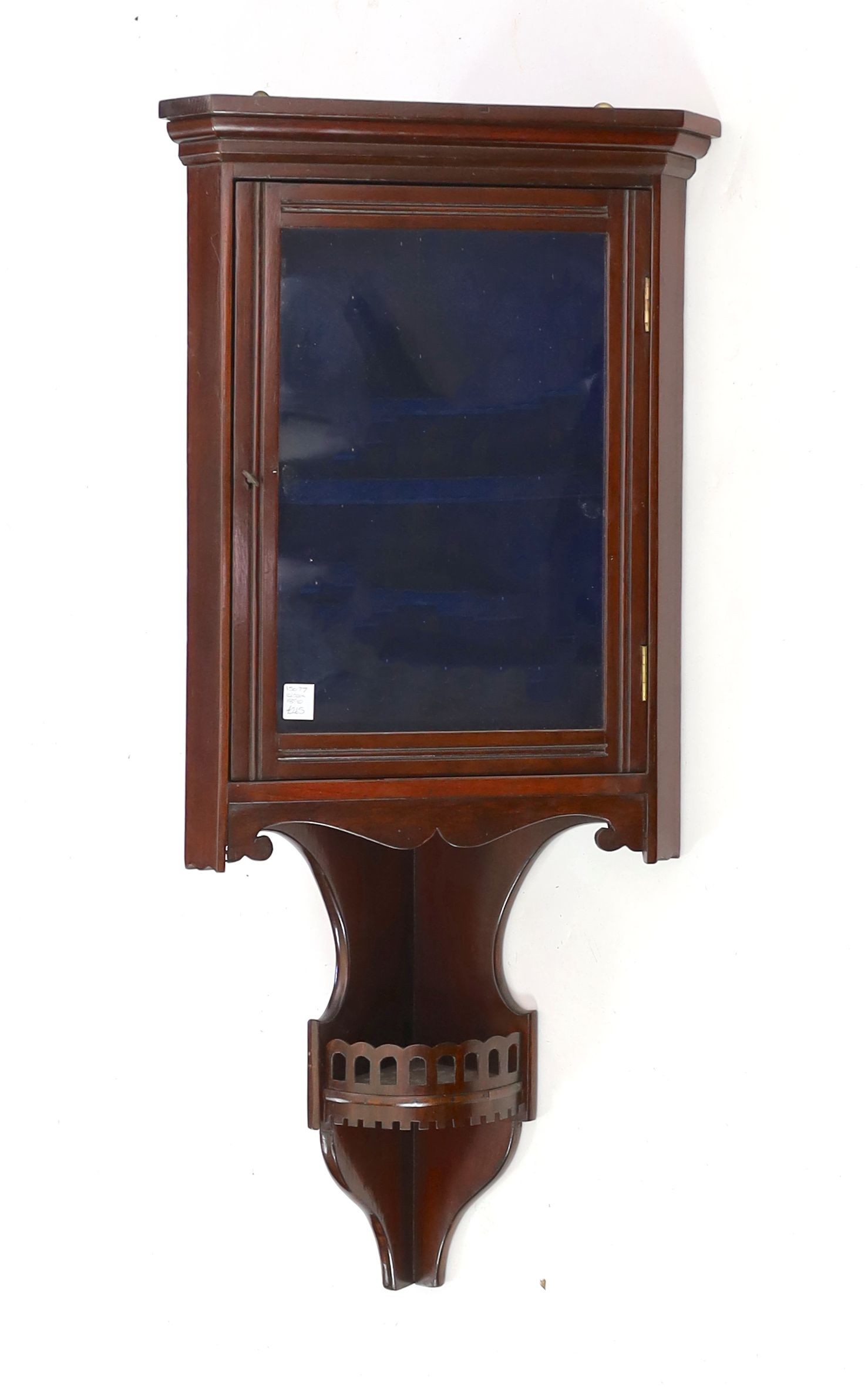 An Edwardian mahogany hanging corner cabinet, width 33cm height 90cm